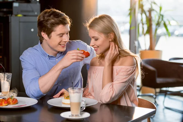 Couple in love having lunch — Stock Photo