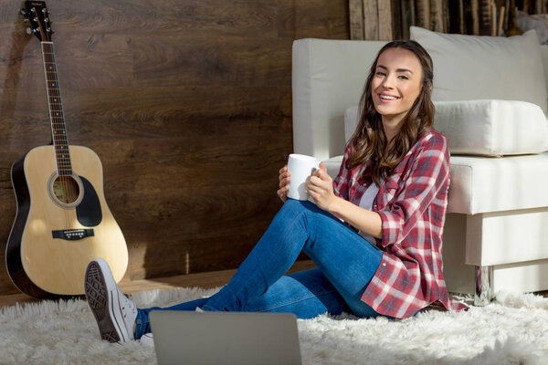 Young woman with tea cup