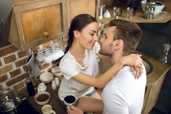 Couple in kitchen in morning Royalty Free Stock Photos