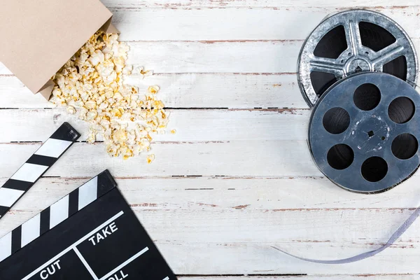 Film reels and movie clapper — Stock Photo, Image