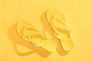 Comfortable yellow flip-flops  clipart