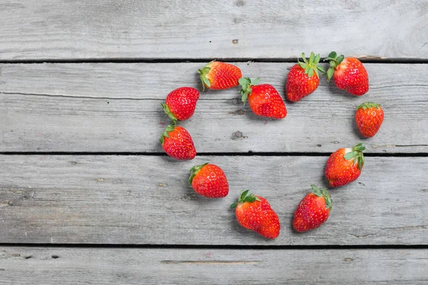 Strawberries in heart shape — Stock Photo, Image