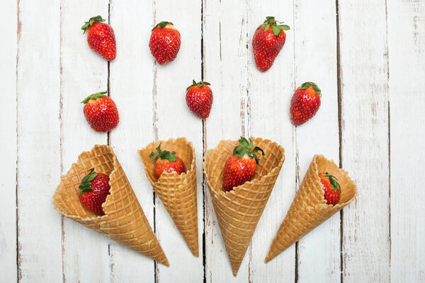 strawberries in waffle cones 