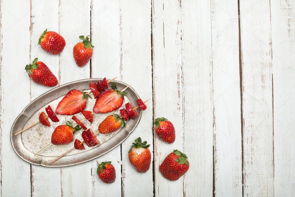 strawberries on wooden skewers