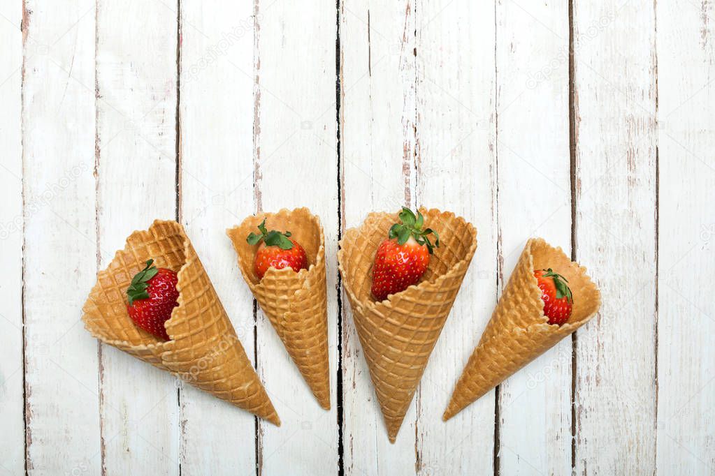 strawberries in waffle cones