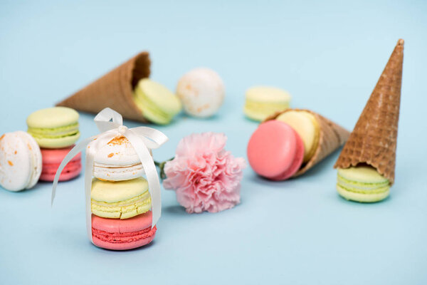 Macarons with flower and waffle cones