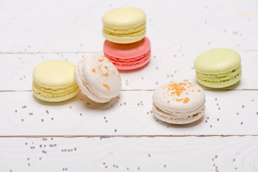 Group of macarons on wooden table