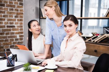Young businesswomen at workplace 