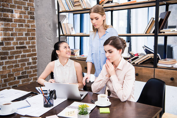 Young businesswomen at workplace 