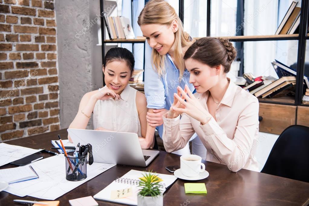 Young businesswomen at workplace 