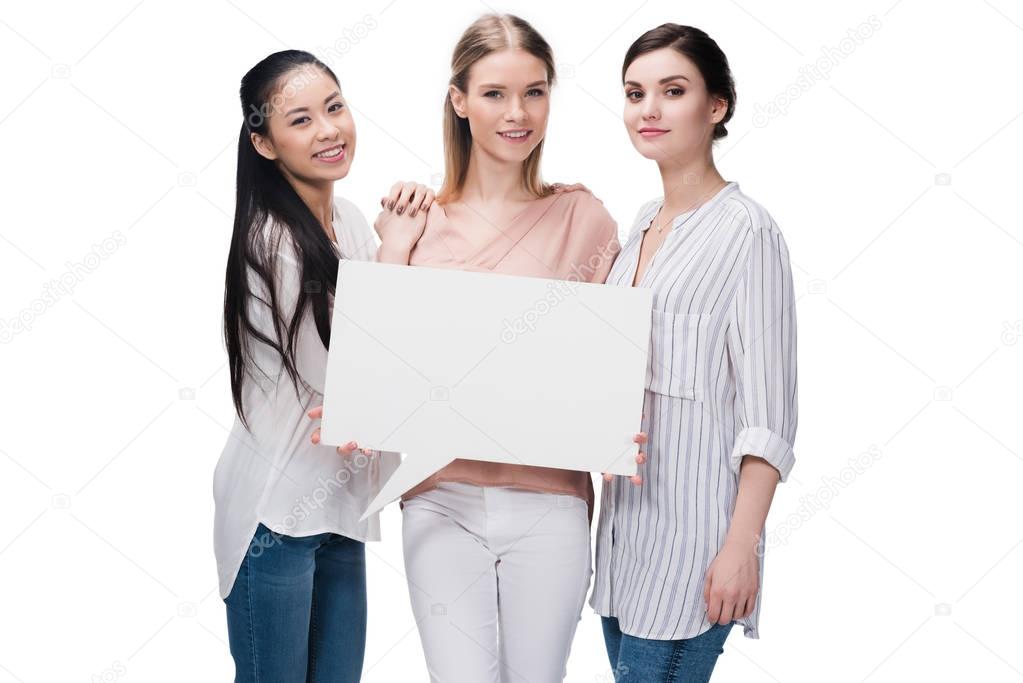 women holding blank speech bubble