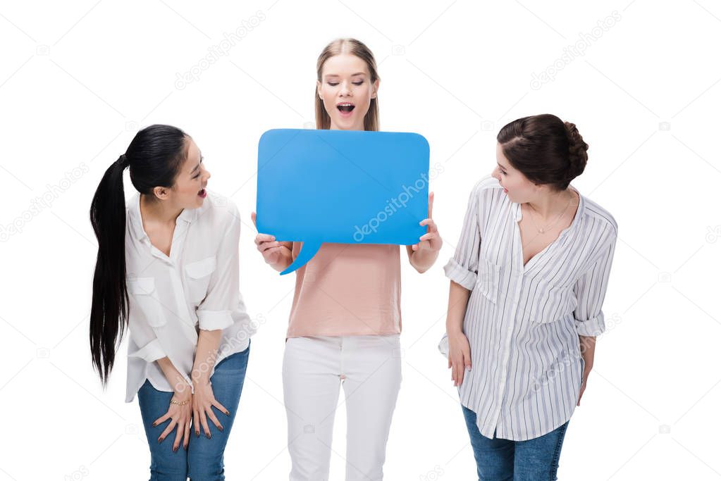 girls holding blank speech bubble