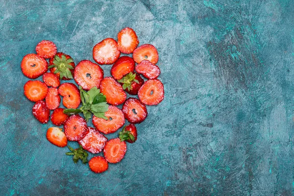 Strawberries in heart shape — Stock Photo