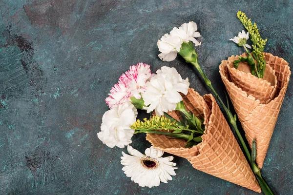 Flowers in sugar cones — Stock Photo