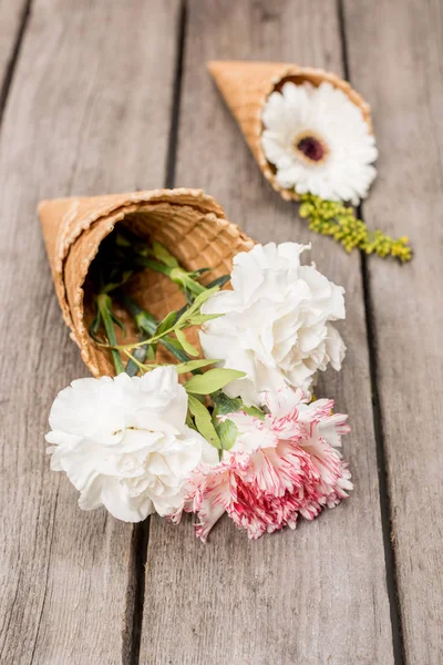 Flowers in sugar cones — Stock Photo