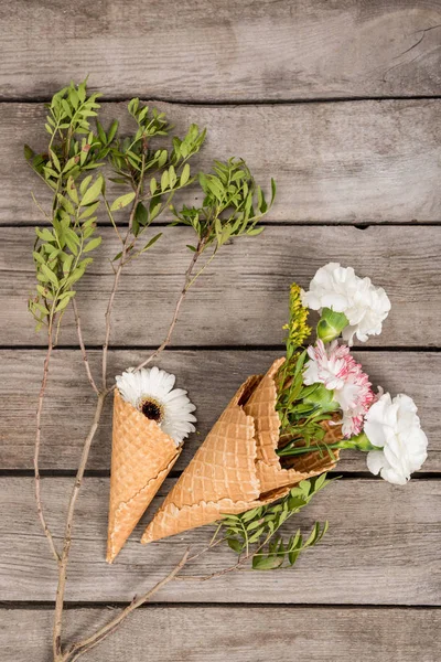 Flowers in sugar cones — Stock Photo