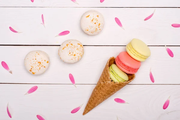 Handmade fresh macarons in waffle cone — Stock Photo