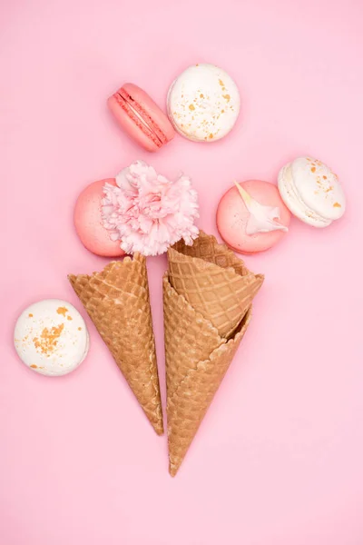 Fresh macarons in waffle cones — Stock Photo