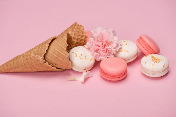 Fresh macarons in waffle cones — Stock Photo