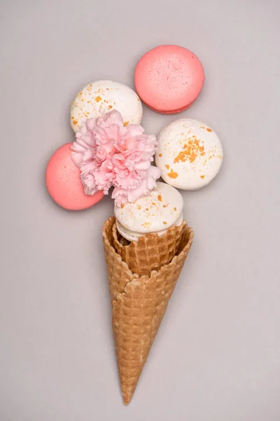 Fresh macarons in waffle cones — Stock Photo