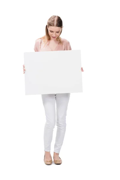 Young woman holding blank banner — Stock Photo