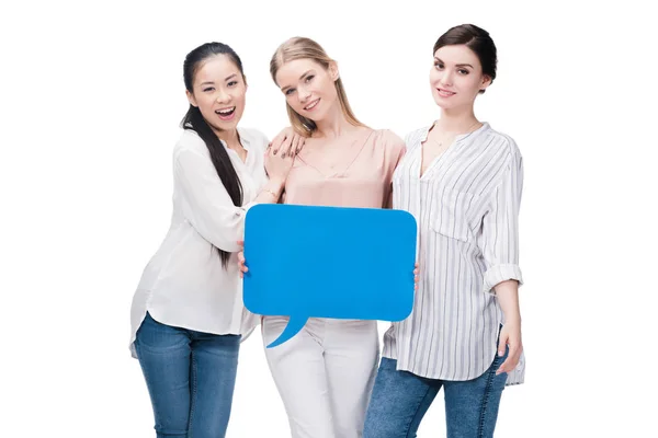 Women holding blank speech bubble — Stock Photo