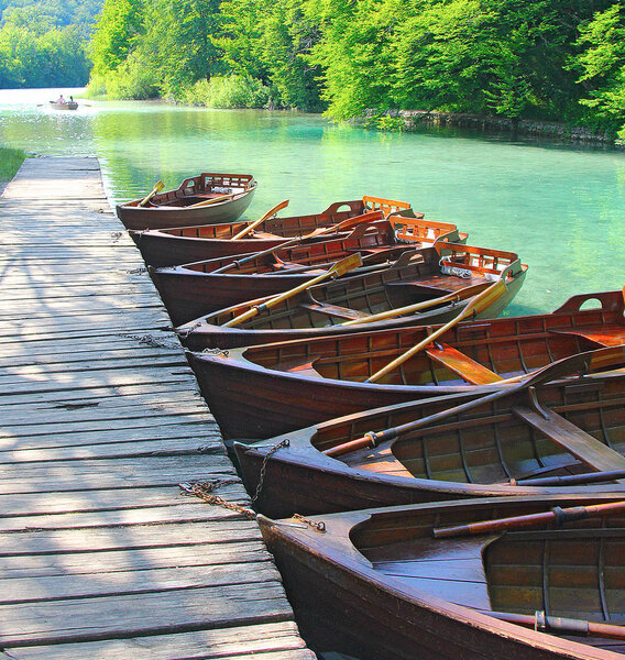 Wooden pleasure boats on the lake. Plitvice. Croatia