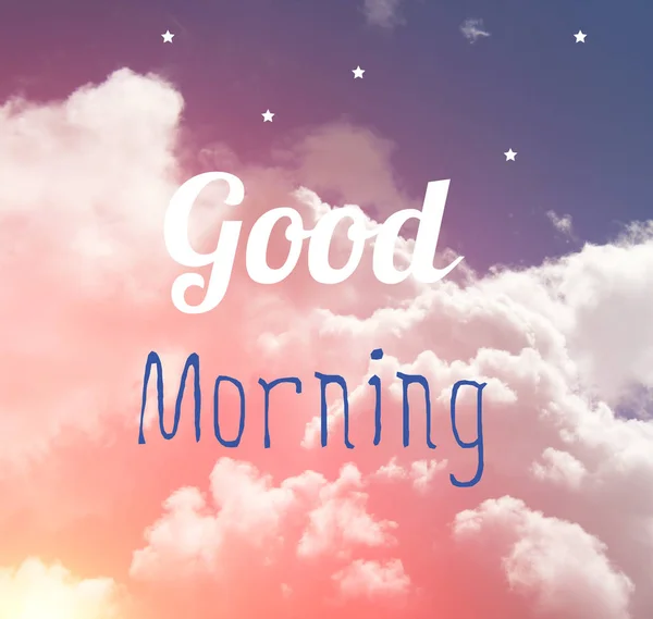 Guten Morgen Wort Buchstabe auf rosa und blauen Pastellhimmel und weißen Sternen. romantische Wolken. — Stockfoto