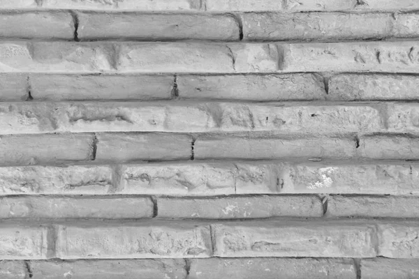 Old Wall of White and Gray Brayed and Cracked Old Bricks. Gray and White Brick Background. — Stock Photo, Image