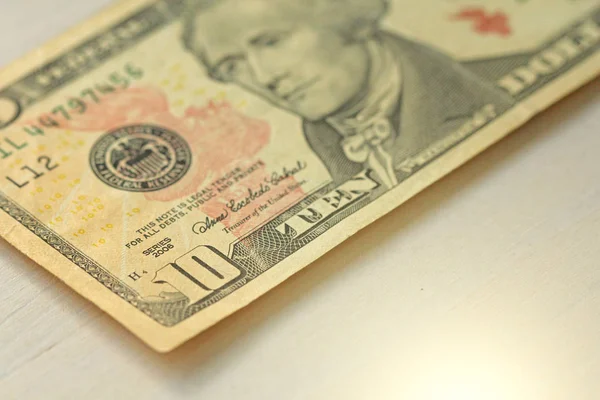 Dez dólares com uma nota. 10 Dólares — Fotografia de Stock