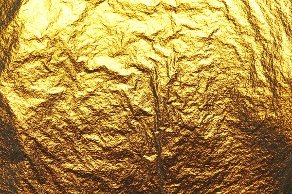 Golden shiny background. Bright golden background, sparkles and shines. A brush stroke.Foil. — Stock Photo, Image