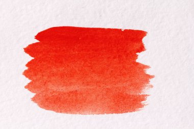 Turuncu bir fırça darbesiyle suluboya ile yaptı. Kağıt arka plan. Arka plan dekorasyon ve tasarım için. Suluboya arka plan ve boşanma.