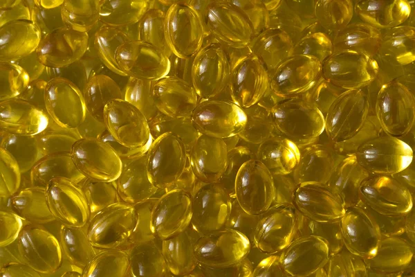 Goldener Hintergrund Kapseln Gefüllte Kapseln Mit Vitamin Vitamin Fischöl Omega — Stockfoto