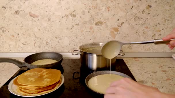 Ladle Pours Dough Russian Pancakes Hot Pan Female Hand Distributes — Stock Video