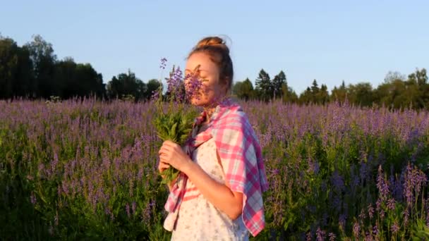 Young Girl European Appearance Pink Checkered Shirt Holds Bouquet Lilac — Stock Video