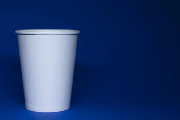 Empty White Paper Cup Blue Background Horizontal Photo — Stock Photo, Image