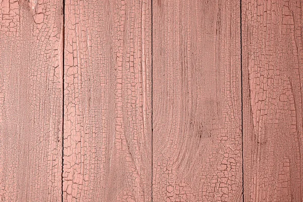 Vertical cracked wooden background toned in coral — Stock Photo, Image