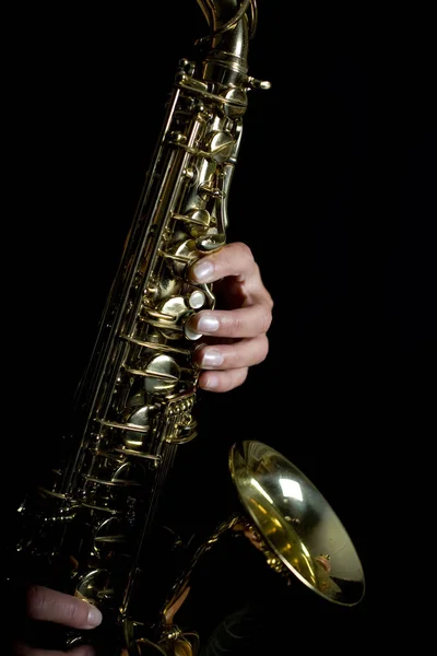 Hands playing saxophone — Stock Photo, Image