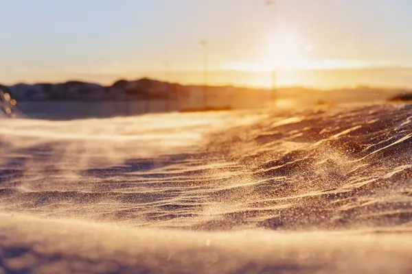 Snow covering surface at sunset — Stock Photo, Image