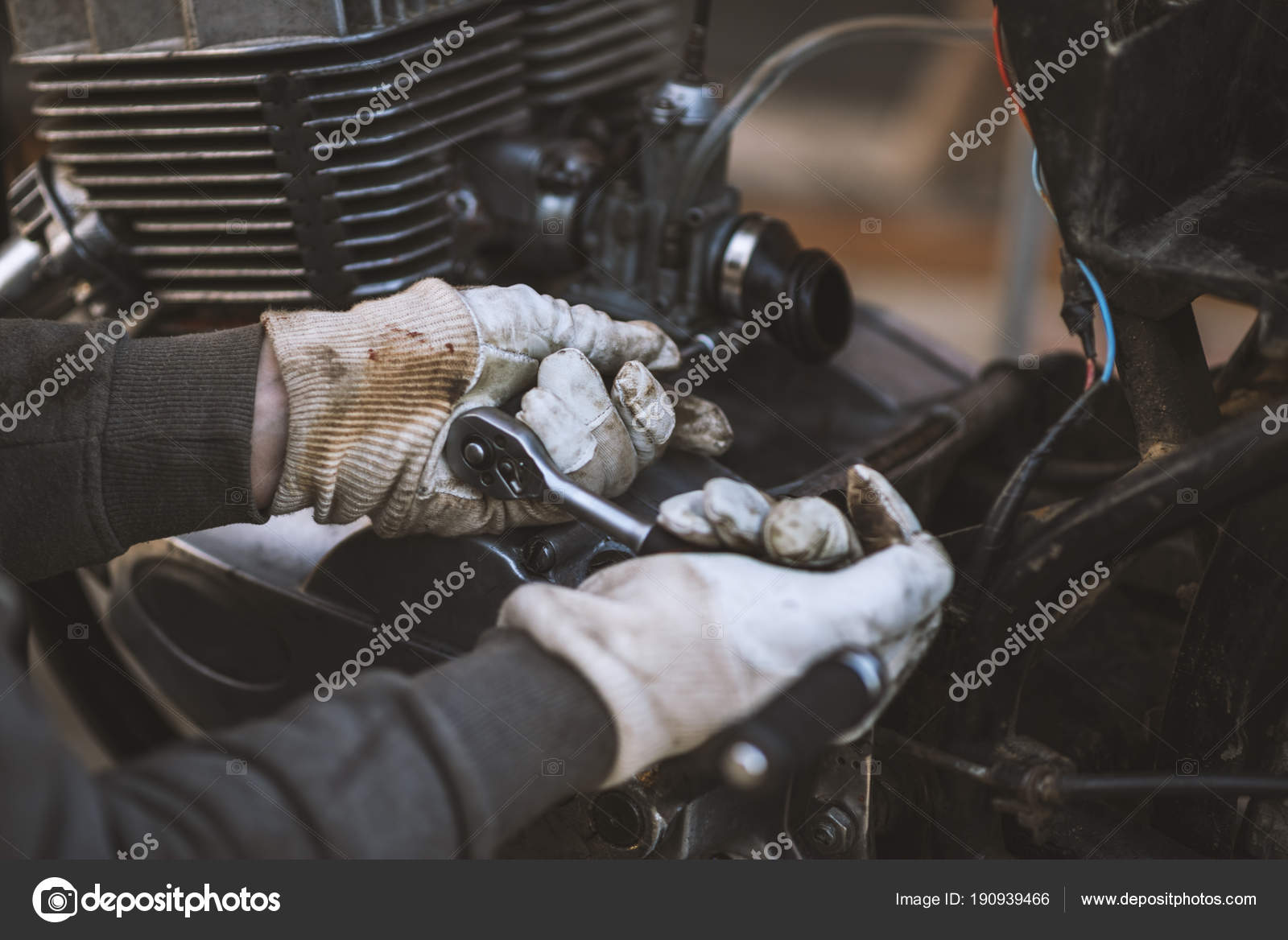 Process of caring and maintain an old motorcycle, retro Stock Photo by