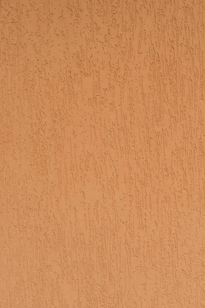 Fragment of a plastered wall in bark beetle style, orange color, sample, facades of houses — Stock Image Fragment of a plastered wall in bark beetle style, orange color, sample, facades of houses Stock Picture