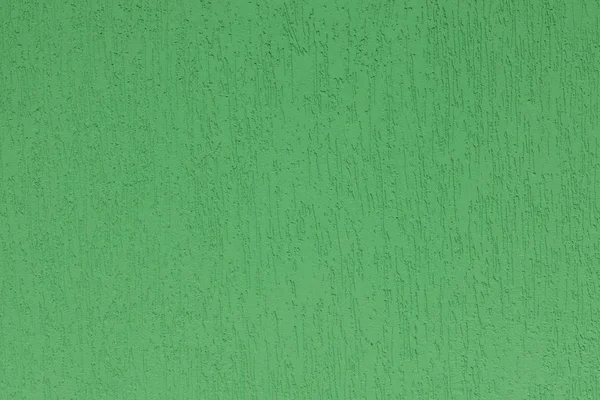 Fragment of a plastered wall in bark beetle style, green color, sample, facades of houses — Stock Image Fragment of a plastered wall in bark beetle style, green color, sample, facades of houses Royalty Free Stock Images
