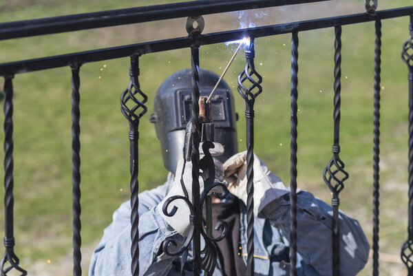 Welding works near the house, work process