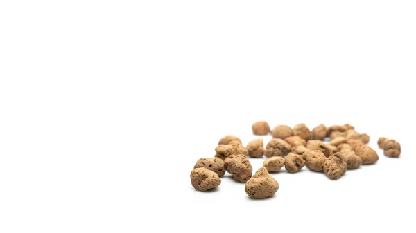 Lightweight expanded clay aggregate, isolated on white background, banner with copy space for text. Building material, also known as claydite — Stock Image Lightweight expanded clay aggregate, isolated on white background, banner with copy space for text. Building material, also known as claydite Stock Picture