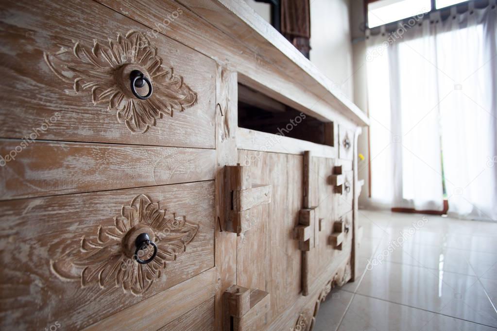 Furniture in classic Balinese style details light wood