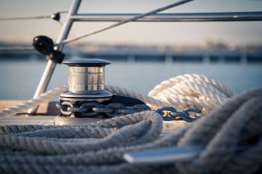 Windlass and mooring ropes on a sailing yacht clipart
