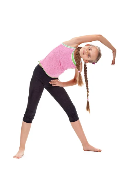 Mladá dívka rozcvičení, strečink a pružnost gymnastické — Stock fotografie