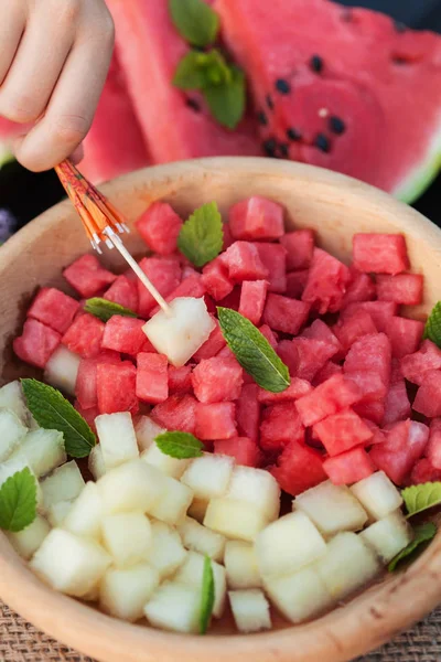 Plate of healthy summer fruit snack - with bites of melon and wa — Stock Photo, Image