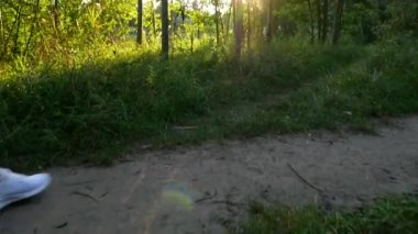 Slow motion girls walking near the lake with fishing tackles
