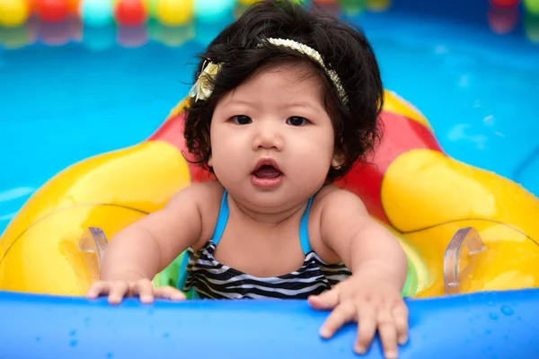 Swimming Baby Girl — Stock Photo, Image